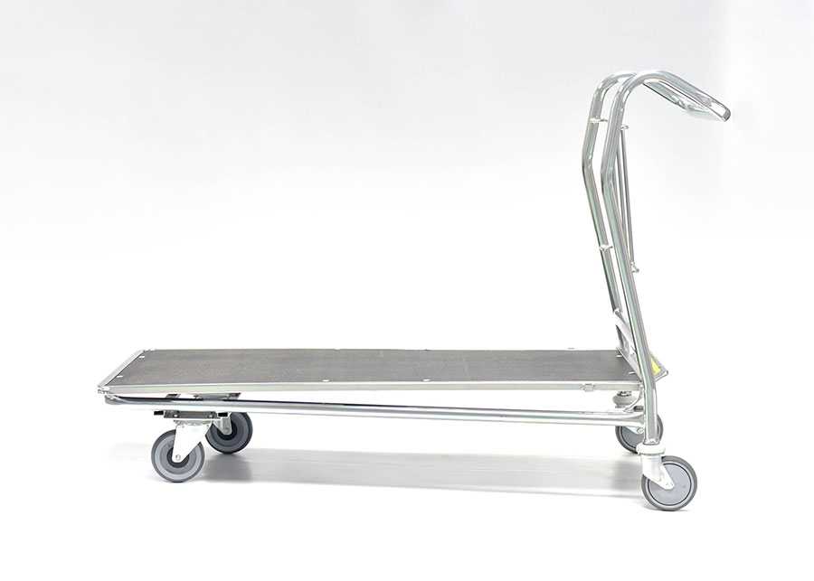 A flat topped trolley in silver on a white background